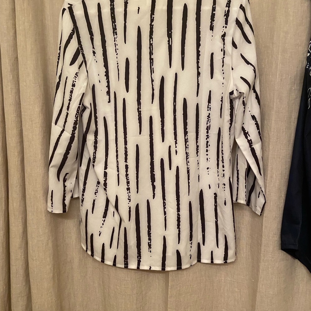 Top polyester. Never with tags on.